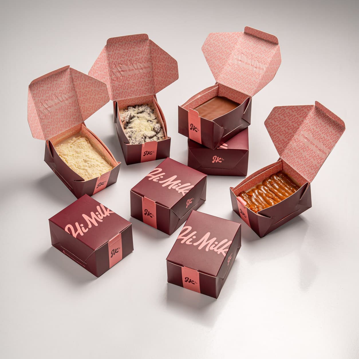 Varias cajas Hi Milk abiertas con distintos sabores
